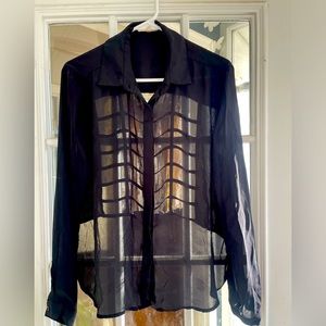 Sheer black top with cutout back detail
